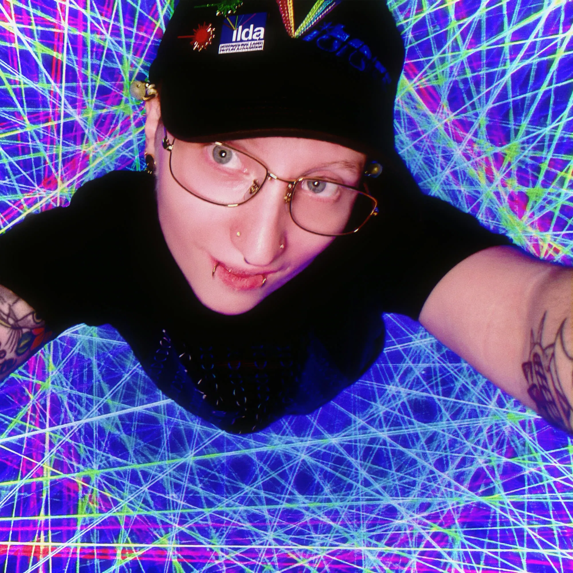 Malachi Sapia surrounded by laser beams